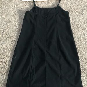 Black dress with ruffled chest area